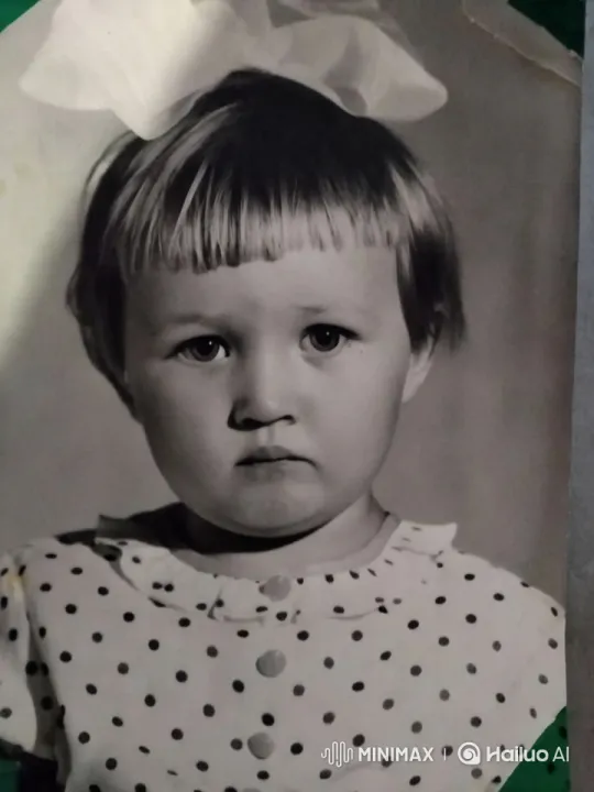 Portrait of a Young Girl in a Polka-Dot Dress – AI Generated Video | Hailuo AI