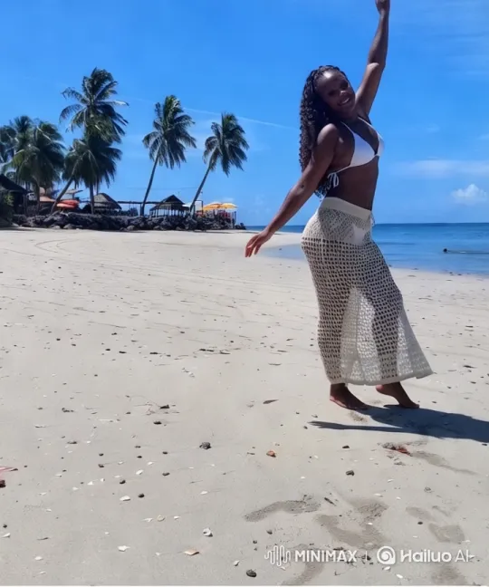 Woman Poses Gracefully on Serene Beach – AI Generated Video | Hailuo AI