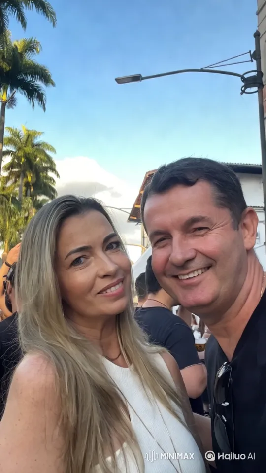 Romantic Couple Kissing in Lively Outdoor Setting – AI Generated Video | Hailuo AI