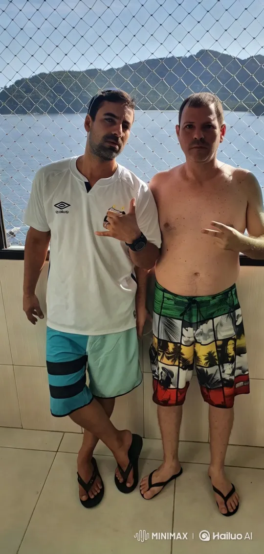 Balcony Scene: Two Men Kiss with Ocean View – AI Generated Video | Hailuo AI