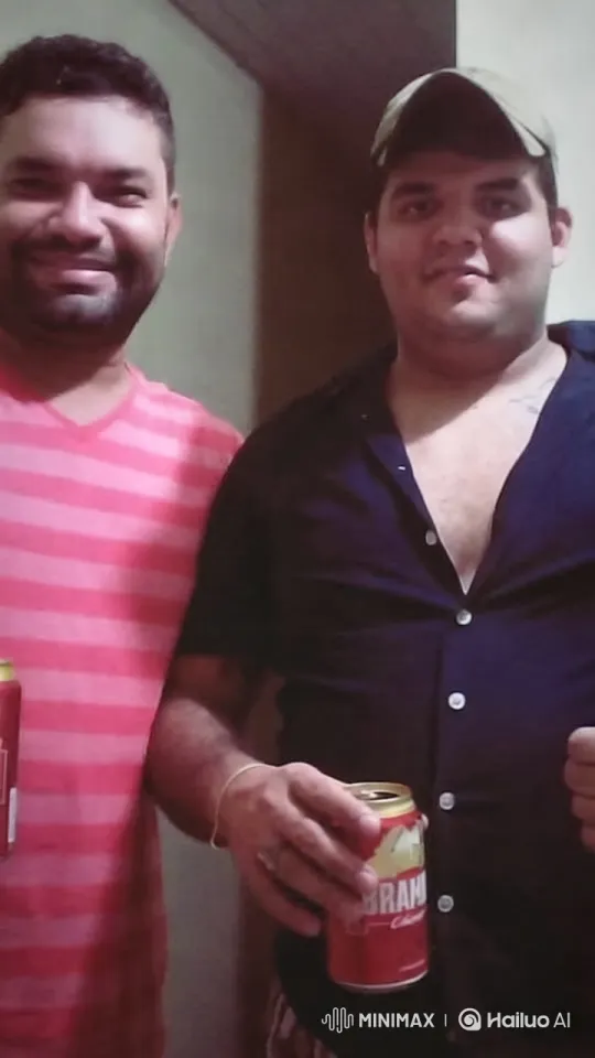 Two Men Enjoying Brahma Beer in a Casual Setting – AI Generated Video | Hailuo AI
