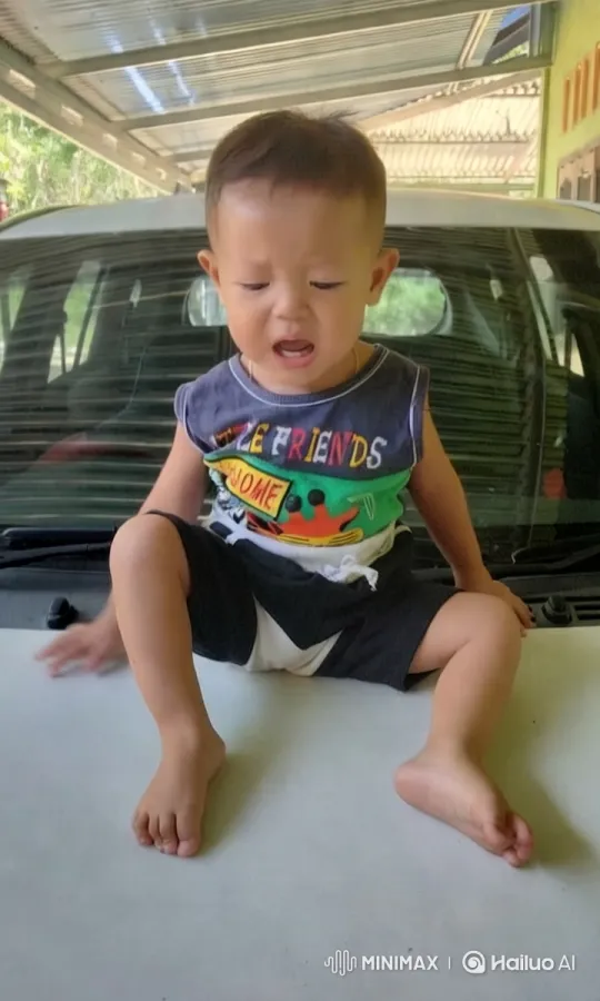 Child Dances on Car Hood in Colorful Outfit – AI Generated Video | Hailuo AI