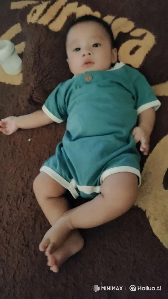 Baby Dancing Joyfully on Colorful Blanket – AI Generated Video | Hailuo AI