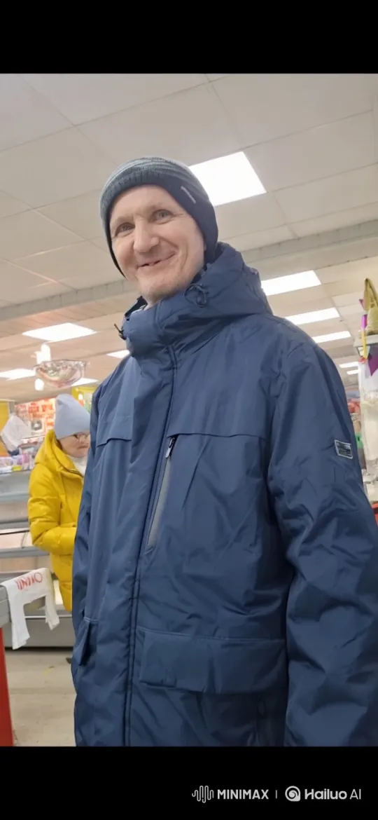 Cheerful Man in Blue Jacket Shows Warm Smile – AI Generated Video | Hailuo AI
