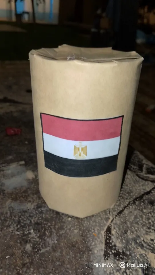 Egyptian Flag-Wrapped Cylinder in Dim Outdoor Setting – AI Generated Video | Hailuo AI