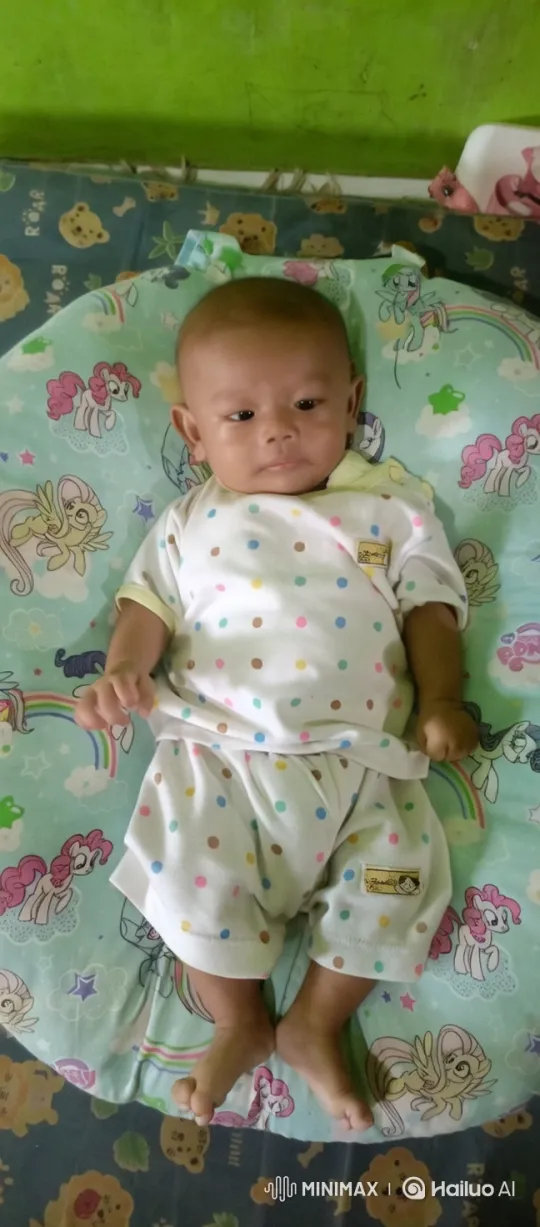Baby Dancing Cheerfully on Colorful Blanket – AI Generated Video | Hailuo AI