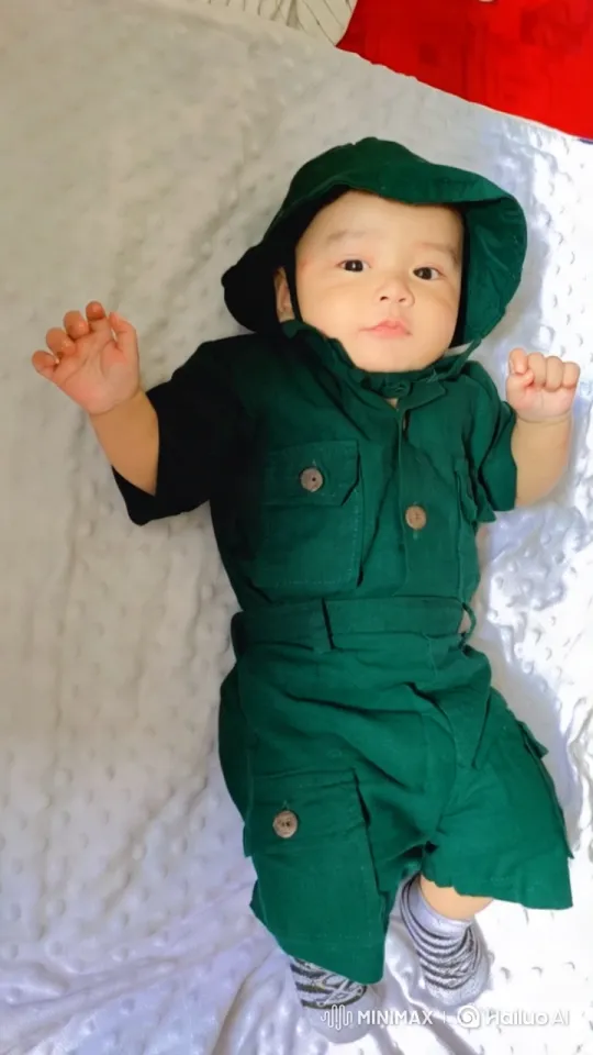 Baby Dancing Joyfully on White Blanket – AI Generated Video | Hailuo AI