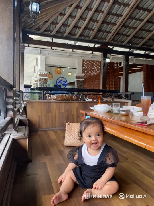 Child's Joyful Dance in Rustic Dining Setting – AI Generated Video | Hailuo AI