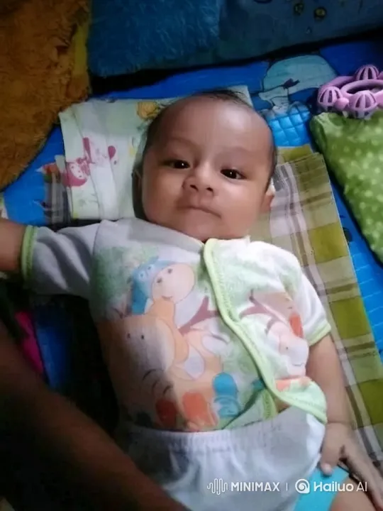 Baby Dancing Joyfully in Colorful Bed Setting – AI Generated Video | Hailuo AI