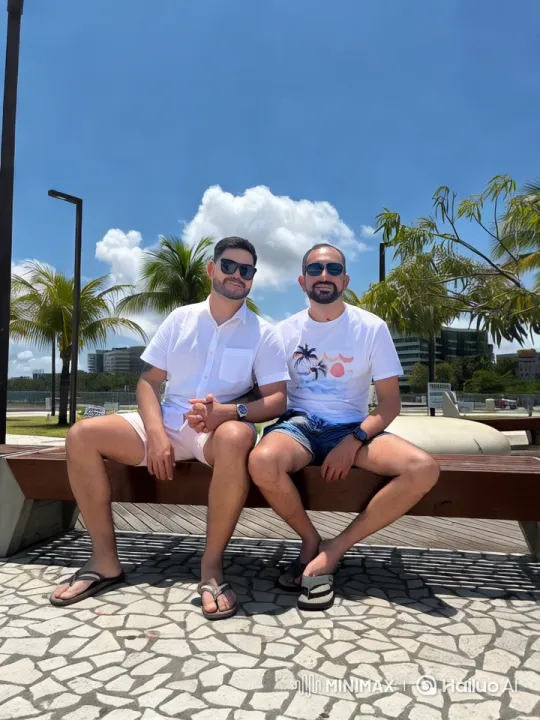 Sunny Park Scene with Two Men on a Bench – AI Generated Video | Hailuo AI