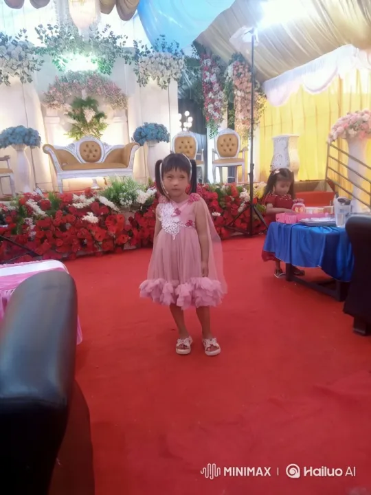 Young Girl Performs Graceful Joget Dance at Festive Celebration – AI Generated Video | Hailuo AI