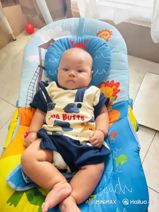 Baby Dancing in Colorful Chair with Sea Creatures – AI Generated Video | Hailuo AI