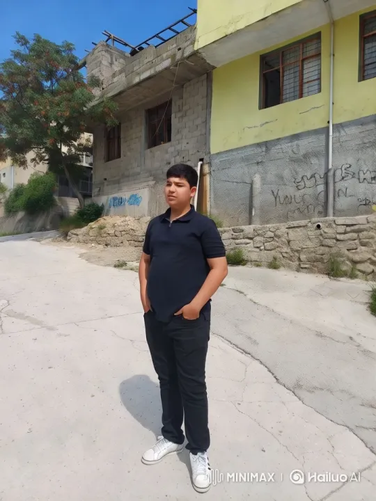 Young Man in Urban Setting with Contrasting Elements – AI Generated Video | Hailuo AI