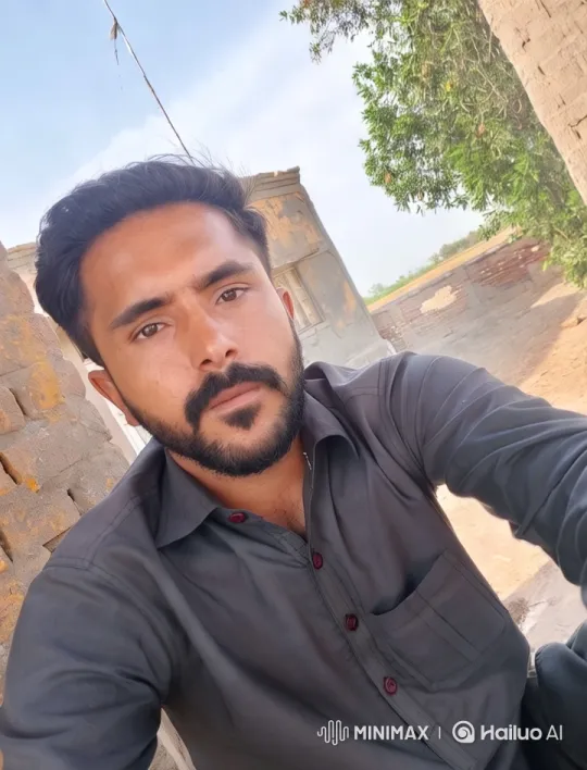 Young Man in Outdoor Setting with Brick Wall – AI Generated Video | Hailuo AI