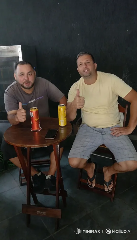 Two Men Enjoying Beer in a Cozy Setting – AI Generated Video | Hailuo AI