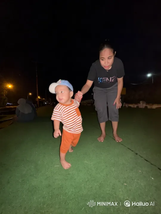 Child and Adult Walking at Night with Tender Guidance – AI Generated Video | Hailuo AI