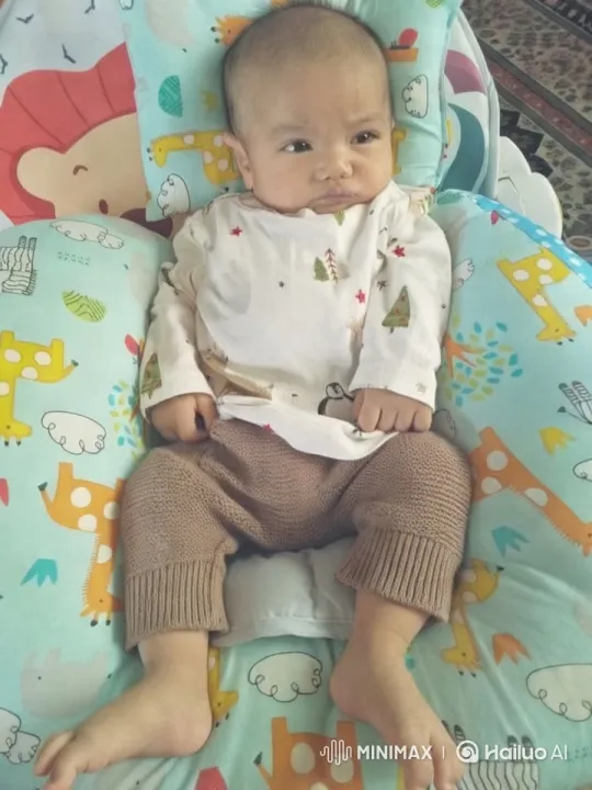 Baby Dancing Joyfully on Animal-Themed Cushion – AI Generated Video | Hailuo AI