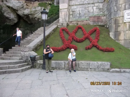 Two Women Embrace Amidst Serene, Decorated Landscape – AI Generated Video | Hailuo AI