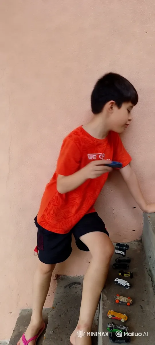 Boy with Toy Car Expresses Hunger Against a Wall – AI Generated Video | Hailuo AI