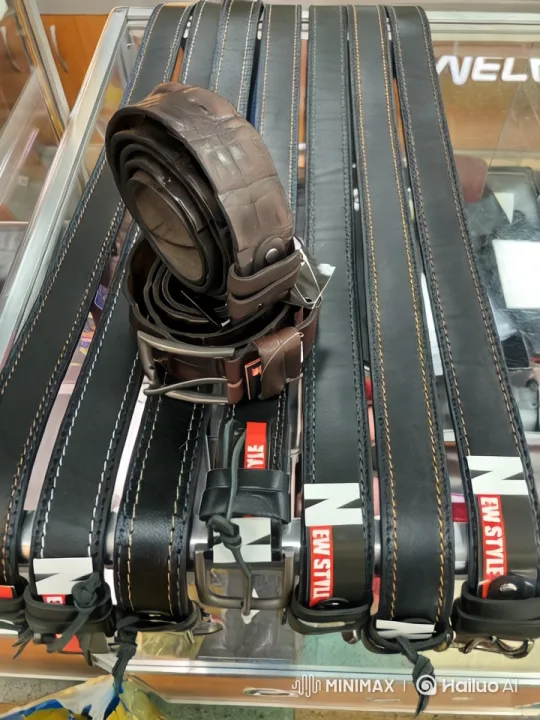 Artful Display of High-Quality Belts in Modern Retail Setting – AI Generated Video | Hailuo AI