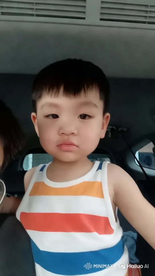 Child Sings Cheerfully in Car, Captivating Camera – AI Generated Video | Hailuo AI