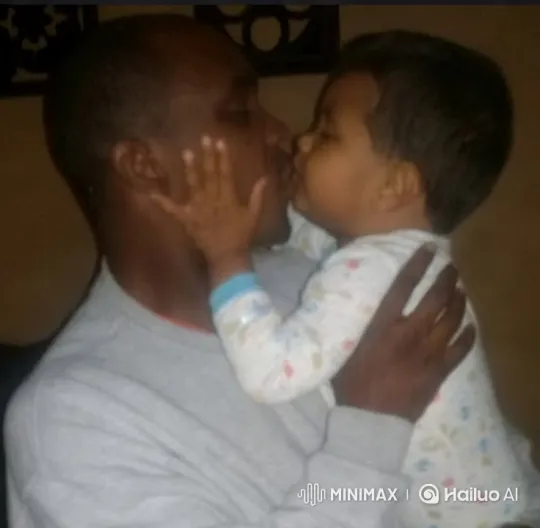 Man and Child Share Intimate Moment – AI Generated Video | Hailuo AI