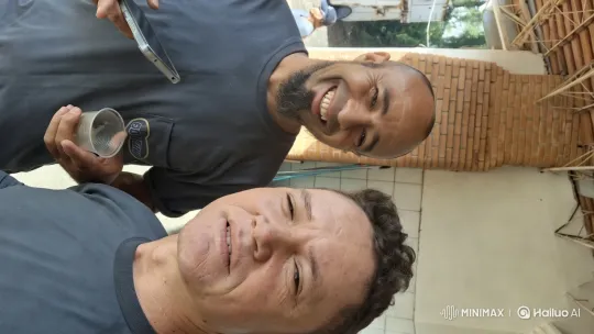 Casual Men Share Intimate Kiss in Industrial Setting – AI Generated Video | Hailuo AI