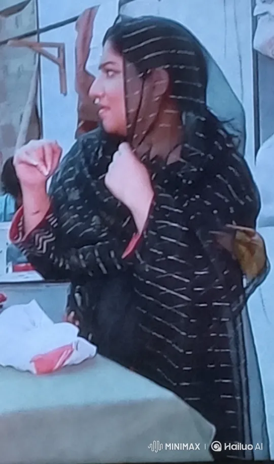 Woman in Traditional Attire in Elegant Kitchen Setting – AI Generated Video | Hailuo AI