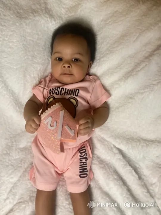 Baby Dances Joyfully with Sparkly '2' Sign – AI Generated Video | Hailuo AI