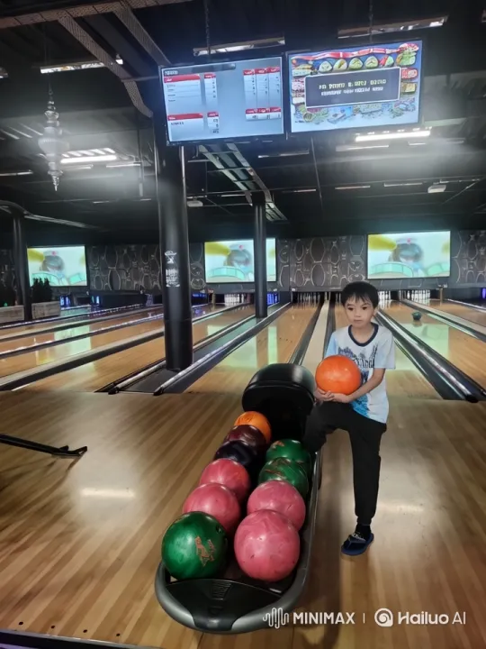 Young Boy Bowling in a Modern Alley – AI Generated Video | Hailuo AI