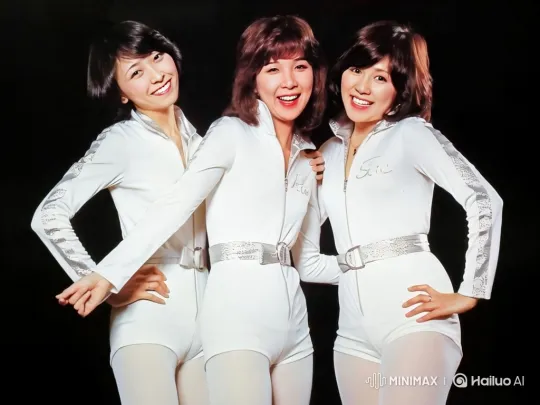 Three Women Pose Joyfully in Dynamic Camera Tracking Shot – AI Generated Video | Hailuo AI