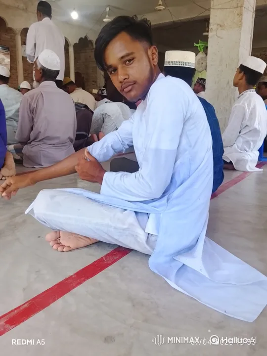 Young Man Manifests iPhone, Alarms Praying Men – AI Generated Video | Hailuo AI