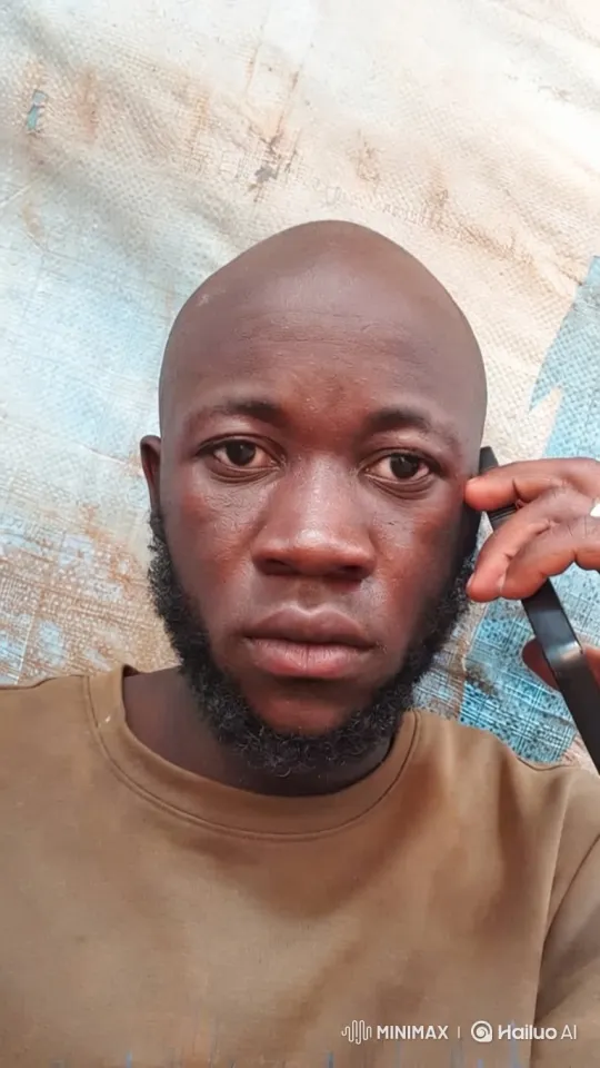 Man on Phone: Close-Up Study of Introspection – AI Generated Video | Hailuo AI