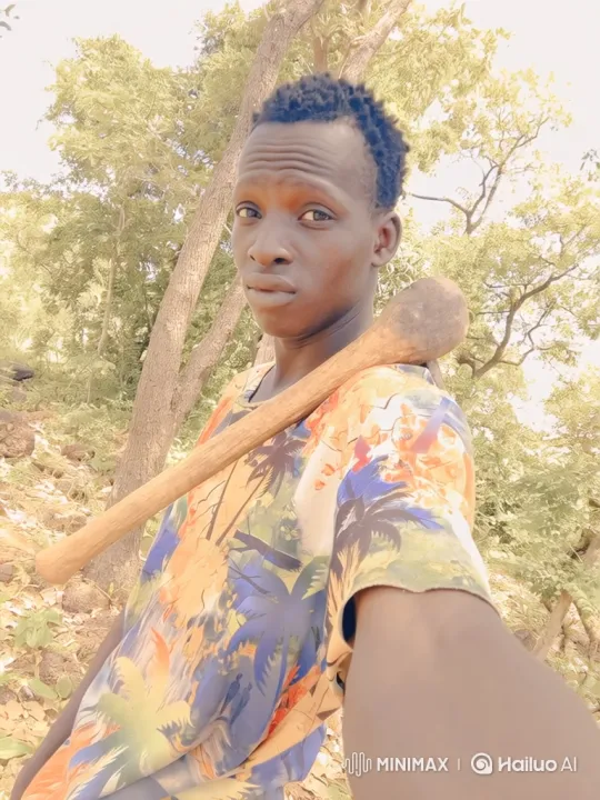 Young Black Man Smiling in Woods with Club – AI Generated Video | Hailuo AI