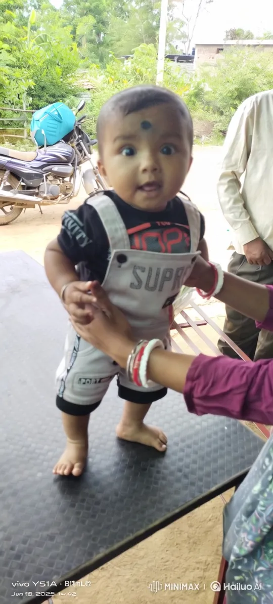 Baby and Kitten Play in a Lush Garden Setting – AI Generated Video | Hailuo AI