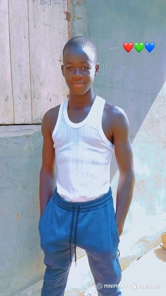 Young Man Smiles, Walks in Sunlit Outdoor Setting – AI Generated Video | Hailuo AI