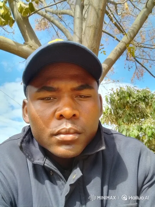 Man in Thoughtful Stare with Blurring Background – AI Generated Video | Hailuo AI