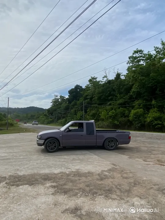 Custom Purple Pickup Demonstrates Air Suspension Lowering – AI Generated Video | Hailuo AI