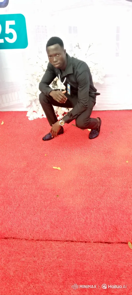 Young Man in Black Attire Stands Confidently on Red Carpet – AI Generated Video | Hailuo AI