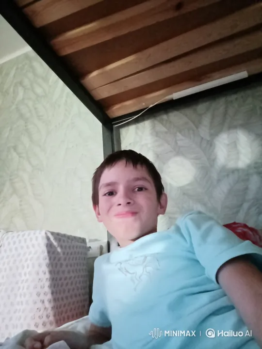 Young Boy Dances Cheerfully in White Background – AI Generated Video | Hailuo AI