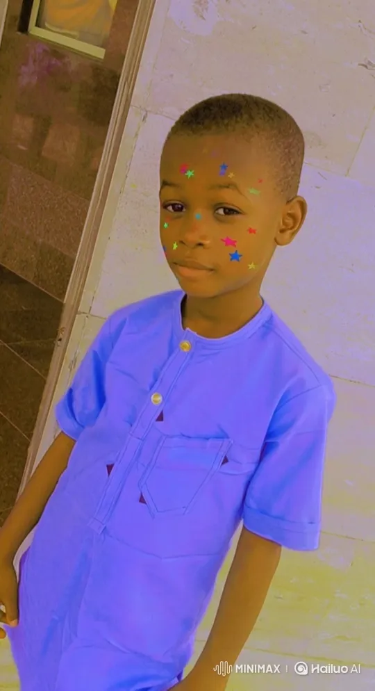 Boy with Star Stickers in Gentle, Slow Motion – AI Generated Video | Hailuo AI