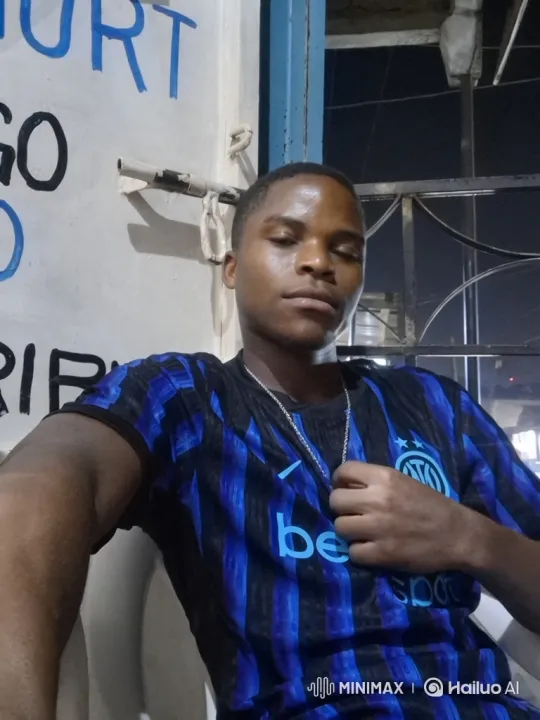 Contemplative Young Man Awakens Gently Indoors – AI Generated Video | Hailuo AI
