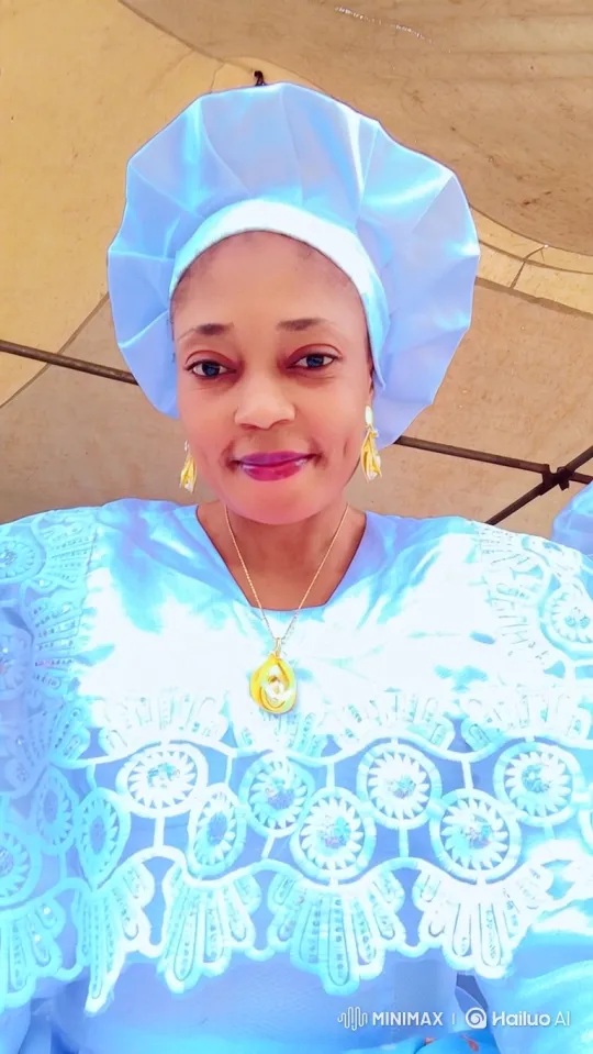 Woman in Light Blue Attire with Serene Smile – AI Generated Video | Hailuo AI