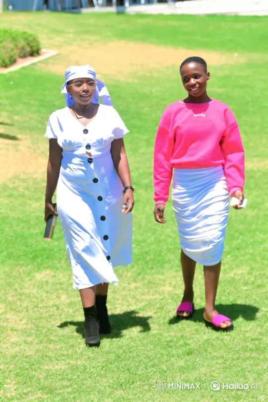 Young Women Stroll Across Sunlit Lawn – AI Generated Video | Hailuo AI