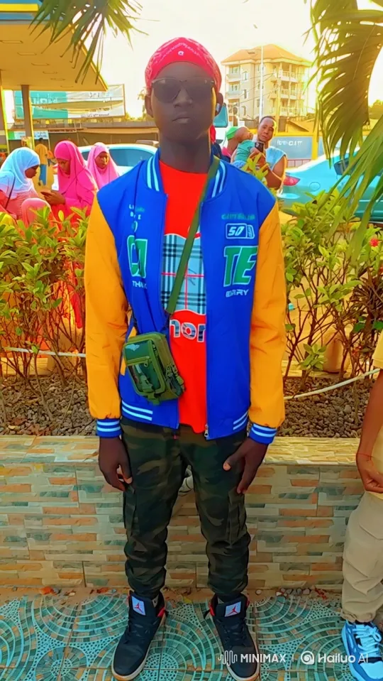 Young Man in Contemporary Street Style Stands Still – AI Generated Video | Hailuo AI