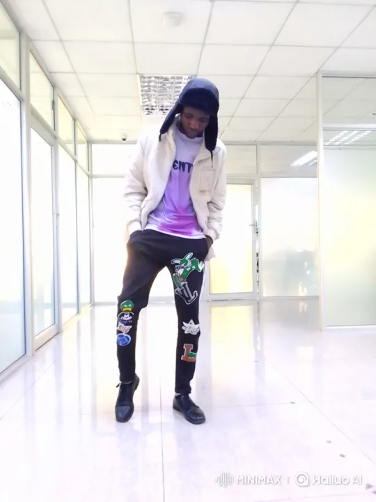 Person in Reflective Corridor with Tracking Camera Shot – AI Generated Video | Hailuo AI