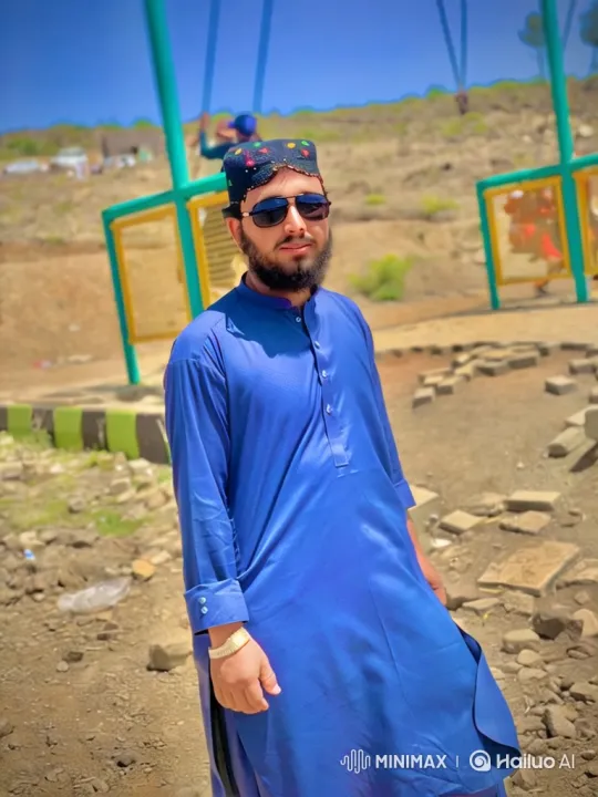 Confident Man Poses with Lamborghini on Mountain Road – AI Generated Video | Hailuo AI