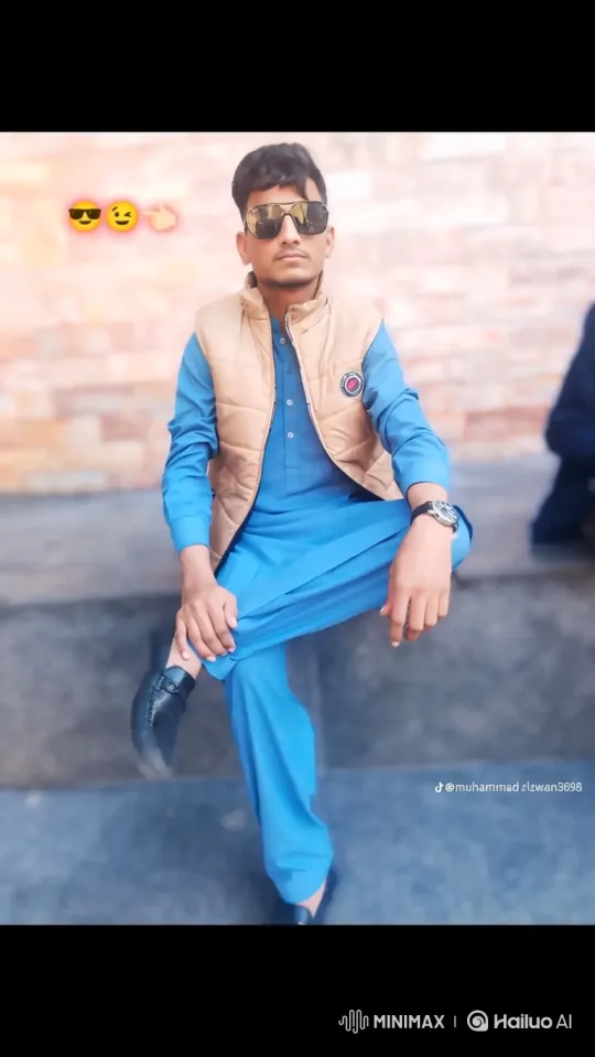 Stylish Young Man on Steps with Confident Gaze – AI Generated Video | Hailuo AI