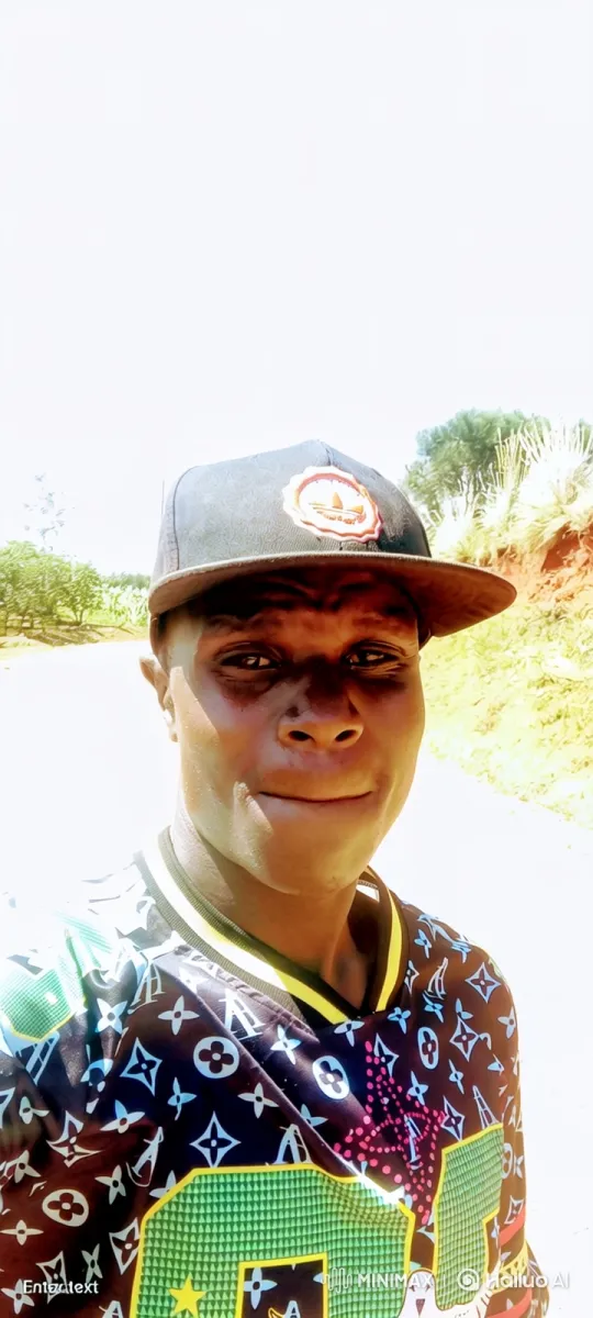 Young Man on Dirt Road with Fluid Camera Tracking – AI Generated Video | Hailuo AI