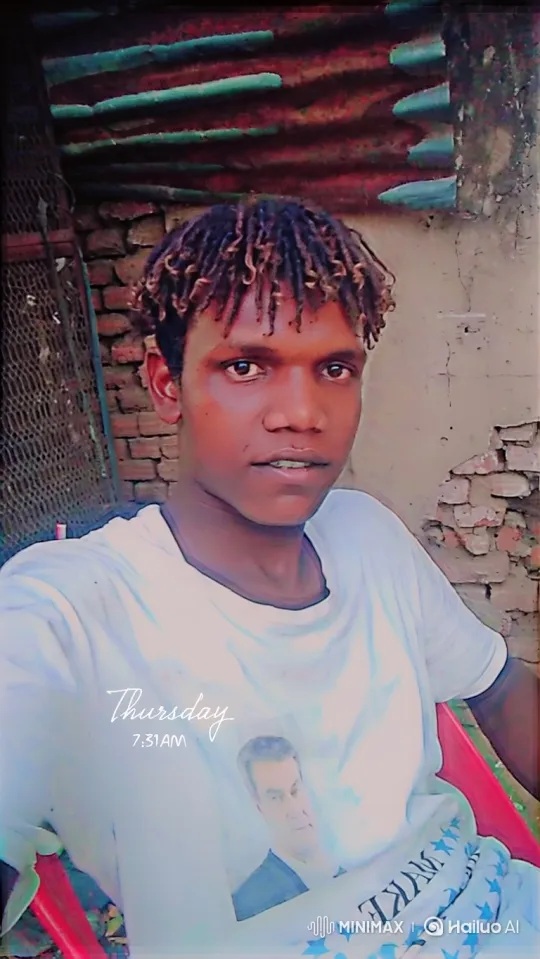 Young Man with Two-Toned Dreadlocks Maintains Gentle Smile – AI Generated Video | Hailuo AI